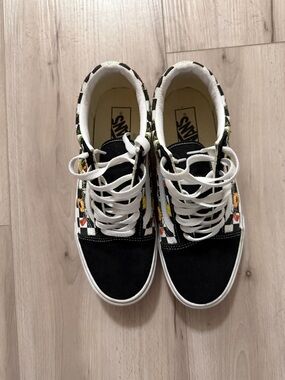 Vans Black Checkerboard Sneakers with Multicolor Cartoon Accents